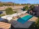 Inviting community pool with pristine water, covered pergola, and views of Camelback Mountain at 1920 E Maryland Ave # 16, Phoenix, AZ 85016