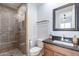 Stylish bathroom with a walk-in shower, modern vanity, and contemporary fixtures at 22970 N 79Th Pl, Scottsdale, AZ 85255