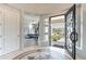 Foyer featuring decorative tile and an open front door at 22970 N 79Th Pl, Scottsdale, AZ 85255