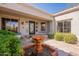 Charming courtyard with a water feature and front door at 22970 N 79Th Pl, Scottsdale, AZ 85255