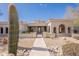 Southwest home featuring desert landscaping with barrel tile roof at 22970 N 79Th Pl, Scottsdale, AZ 85255