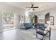 Living Room with access to the backyard, neutral decor, and open floor plan at 22970 N 79Th Pl, Scottsdale, AZ 85255