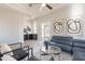 Living Room featuring modern furnishings, neutral paint and a wet bar in the distance at 22970 N 79Th Pl, Scottsdale, AZ 85255