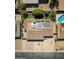 Aerial view of a residential property featuring solar panels and a private pool at 2349 E Sahuaro Dr, Phoenix, AZ 85028