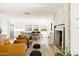 Stylish living room with open concept flowing into the kitchen and dining area at 2349 E Sahuaro Dr, Phoenix, AZ 85028