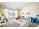 Bright and cheerful playroom with large window, plenty of natural light and neutral colors at 2349 E Sahuaro Dr, Phoenix, AZ 85028