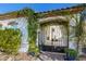 Charming gated courtyard with wrought iron gate and lush climbing vines at 2454 E Ebony Dr, Chandler, AZ 85286