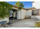 Secluded courtyard patio with seating area and lush greenery at 2454 E Ebony Dr, Chandler, AZ 85286