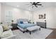 The main bedroom features a plush gray bed with accent pillows, a gray bench, and elegant furnishings at 2454 E Ebony Dr, Chandler, AZ 85286