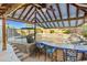 Captivating poolside bar featuring a covered patio, seating, and clear views of the pool and lush landscaping at 2454 E Ebony Dr, Chandler, AZ 85286