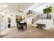 Bright living room with a piano, modern staircase, and a high ceiling, creating an open and airy atmosphere at 25 W Frier Dr, Phoenix, AZ 85021