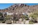 Desert landscaping complements this modern home in a rocky, mountainous region at 25436 N 114Th St, Scottsdale, AZ 85255