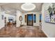 Grand foyer featuring terra cotta floors, recessed lighting, and an open layout leading to the living spaces at 25436 N 114Th St, Scottsdale, AZ 85255