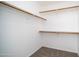 Spacious walk-in closet with multiple shelves and closet rods for optimal storage at 2803 W Angela Dr, Phoenix, AZ 85053