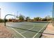 Community basketball court with well-maintained surface, hoops, and perimeter lighting at 3055 N Red Mtn # 178, Mesa, AZ 85207