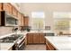 Updated kitchen highlighting stainless steel appliances, a gas range, and lots of natural light at 3055 N Red Mtn # 178, Mesa, AZ 85207