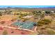 Birds-eye view of community park with pickleball courts, baseball fields, playground, and desert mountain views at 3129 W Walter Way, Phoenix, AZ 85027