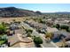 A picturesque view of a desert neighborhood with stunning mountain views and well-maintained homes at 3129 W Walter Way, Phoenix, AZ 85027