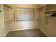 Spacious walk-in closet with shelving and hanging rods for ample storage at 3129 W Walter Way, Phoenix, AZ 85027