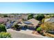 Inviting single-story home with mature trees, a spacious three-car garage, and a tile roof at 3129 W Walter Way, Phoenix, AZ 85027