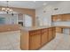 Open concept kitchen island offers lots of space, and transitions to adjacent living spaces at 3129 W Walter Way, Phoenix, AZ 85027