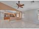 Bright living area showcasing an open layout with windows and seamless access to the kitchen at 3129 W Walter Way, Phoenix, AZ 85027