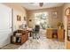 Bright home office featuring a desk and a large window overlooking the front yard at 3350 W Ivanhoe Ct, Chandler, AZ 85226