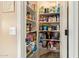 Organized pantry with ample shelving, offering efficient storage solutions for all your kitchen essentials at 3350 W Ivanhoe Ct, Chandler, AZ 85226