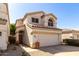 Charming two-story home with a two car garage and desert landscaping at 3435 E Renee Dr, Phoenix, AZ 85050