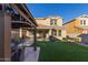 Backyard view featuring patio, lawn, and covered gazebo at 3483 W Verde River Rd, San Tan Valley, AZ 85144