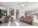 Open-concept floor plan showcasing the living room with modern furnishings and neutral color palette at 3483 W Verde River Rd, San Tan Valley, AZ 85144