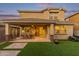 Spacious covered patio extends from the home, seamlessly blending indoor and outdoor living at 3483 W Verde River Rd, San Tan Valley, AZ 85144