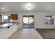 A dining area features tile flooring and direct access to the backyard at 3524 W Alyssa Ln, Phoenix, AZ 85083