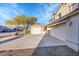 Spacious driveway leading to a three-car garage offering ample parking at 3524 W Alyssa Ln, Phoenix, AZ 85083