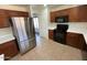 The kitchen boasts stainless steel appliances and wood cabinetry at 3524 W Alyssa Ln, Phoenix, AZ 85083