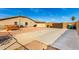 Large driveway and backyard with a hot tub and convenient access, perfect for entertaining at 3608 N Mansfield Dr, Litchfield Park, AZ 85340