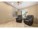 Bonus room featuring 2 chairs, light walls, and a large window for natural light at 3608 N Mansfield Dr, Litchfield Park, AZ 85340