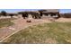 Lush, green front yard with desert landscaping features manicured lawn and stone accents at 3608 N Mansfield Dr, Litchfield Park, AZ 85340
