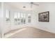 Well-lit bedroom with plantation shutters and carpet flooring at 3792 E Westchester Dr, Chandler, AZ 85249