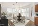 Cozy dining area featuring a chandelier and lots of natural light at 3792 E Westchester Dr, Chandler, AZ 85249