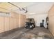 Spacious garage with epoxy floors, storage cabinets and golf cart parking at 3792 E Westchester Dr, Chandler, AZ 85249