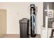 Water filtration system in garage with water heater at 3792 E Westchester Dr, Chandler, AZ 85249