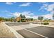 Gated Solera community entrance with desert landscaping and blue skies at 3792 E Westchester Dr, Chandler, AZ 85249