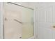 Shower with a glass sliding door and a built-in seat at 3792 E Westchester Dr, Chandler, AZ 85249