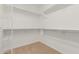 Walk-in closet equipped with shelving and hanging rods at 3792 E Westchester Dr, Chandler, AZ 85249