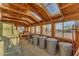 Interior of shed with hay bales, transparent ceiling, and metal trash cans at 38024 N 15Th Ave, Phoenix, AZ 85086