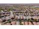 Picturesque aerial view of neighborhood with pools and green spaces at 3967 E Hematite Ln, San Tan Valley, AZ 85143