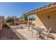 Enjoy outdoor living with a covered patio and a view of the backyard lounge area at 3967 E Hematite Ln, San Tan Valley, AZ 85143