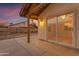 Outdoor back patio area with a covered ceiling and sliding glass doors for seamless indoor-outdoor living at 4165 W Park Ave, Chandler, AZ 85226