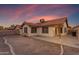 Home backyard with a covered patio area and low-maintenance landscaping, perfect for outdoor enjoyment at 4165 W Park Ave, Chandler, AZ 85226